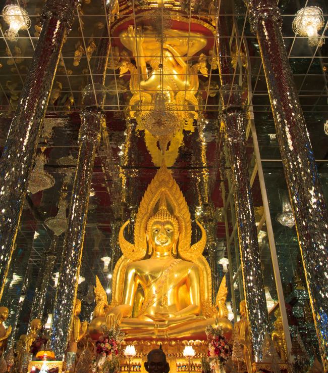 Golden Buddha statue at Cathedral glass, Temple in Thailand